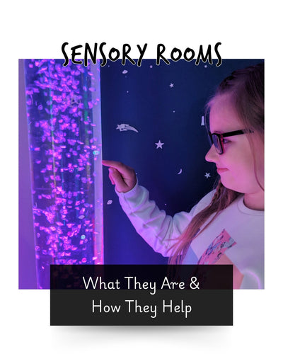 a young child enjoying their bubble tube in their sensory room