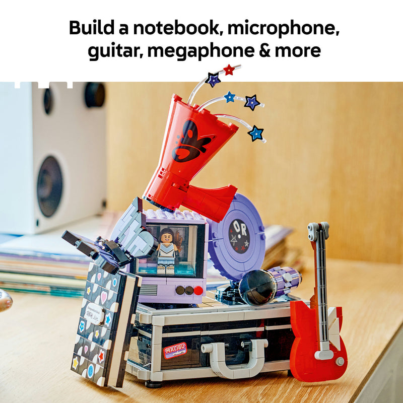 The LEGO Olivia Rodrigo's Secret Storage miniature builds, including a notebook, microphone, guitar and megaphone
