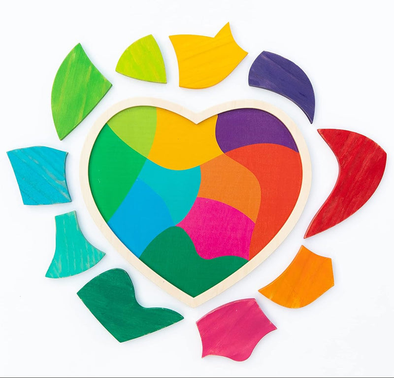 A colorful heart-shaped wooden craft or puzzle board with painted segments in green, blue, yellow, orange, pink, purple, and red, surrounded by matching painted wood pieces on a white background.