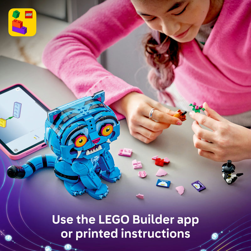 Girl building the LEGO Derpy Tiger set with the LEGO Builder app on a tablet
