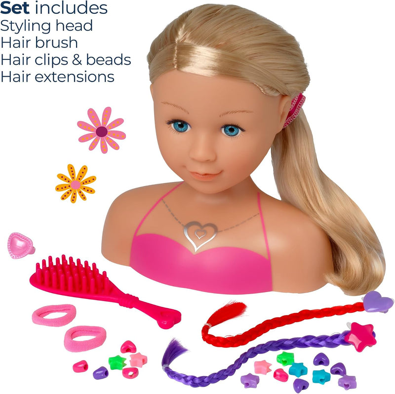 A doll hair styling set displayed on a white background, featuring a blonde doll bust with blue eyes, pink top, and a pink hair accessory, surrounded by included items: a pink hairbrush, pink hair clips and beads, a red braided hair extension, a purple braided hair extension, and a pink styling head. Text in the upper left lists included items.