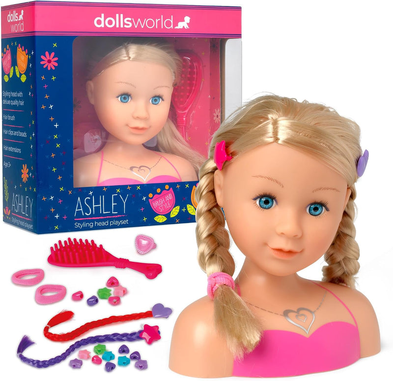 Dolls World styling head player set featuring a blonde doll bust with braided hair, pink top, and accessories including a pink comb, hair clips, rings, and colorful beads, shown next to its blue and pink retail box on a white background.