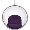 A modern glass bubble hanging chair with a purple velvet cushion inside, suspended by a chrome metal chain against a white background.