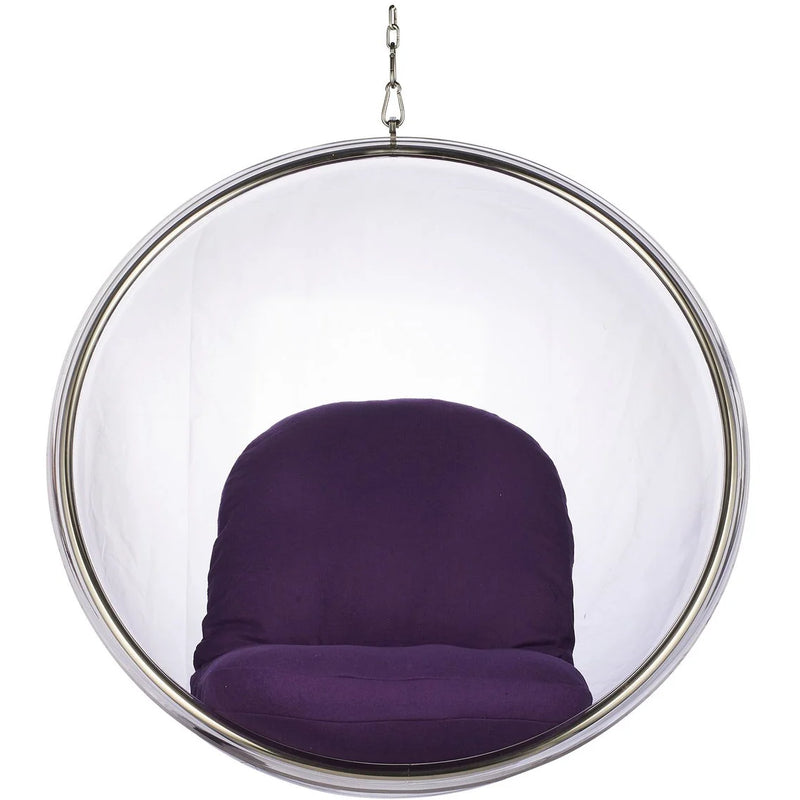A modern glass bubble hanging chair with a purple velvet cushion inside, suspended by a chrome metal chain against a white background.