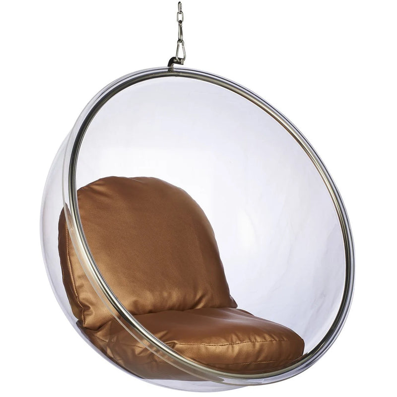 A modern hanging egg chair with a clear transparent spherical shell, a polished silver metal frame, and a brown cushioned seat and backrest, suspended by a chain against a white background.