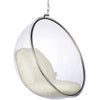 A clear hanging bubble chair with a white cushioned seat and backrest, suspended by a silver metal chain and frame, shown against a plain white background.