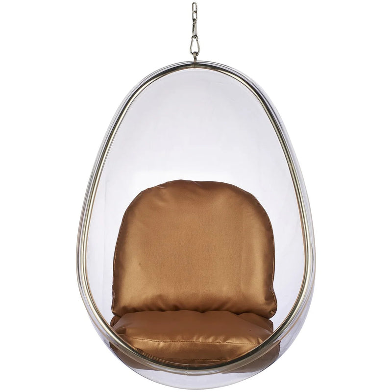 A modern egg-shaped hanging pod chair with a clear transparent shell and a brown satin cushioned seat and backrest, suspended by a metal chain against a white background.