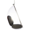 A modern teardrop-shaped hanging chair with a clear acrylic shell, chrome metal frame, and dark gray cushioned seat, suspended by a chain against a white background.