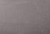 A close-up of a textured fabric with vertical ribbed stripes in a muted grayish-purple tone.