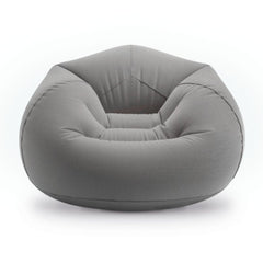 A modern, low-profile bean bag chair in a solid medium gray fabric, shown from a front-facing perspective on a clean white background.