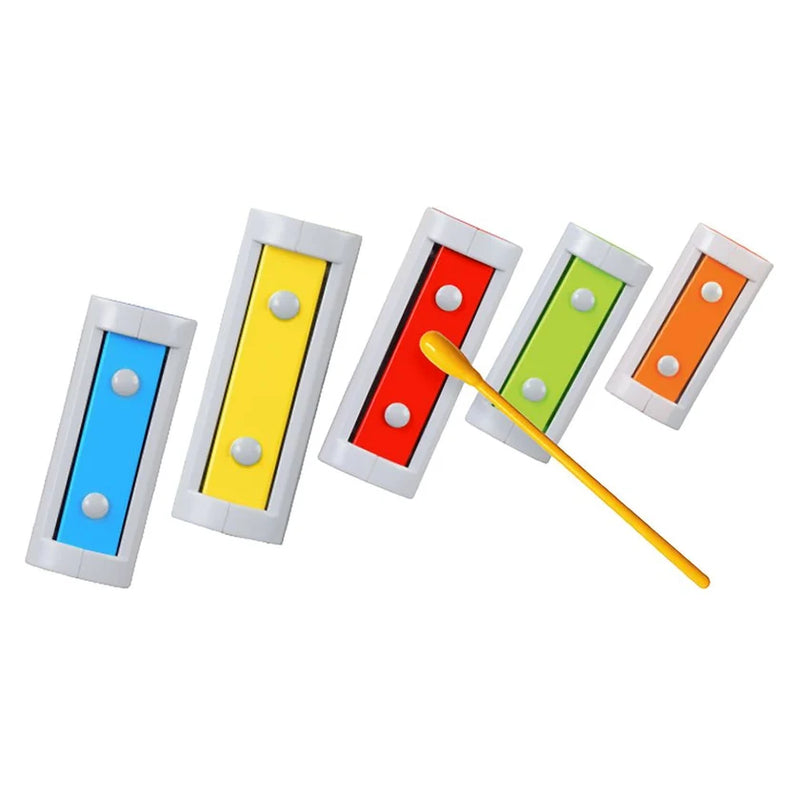 Melody Chimes bars arranged diagonally with a yellow mallet resting against the red bar